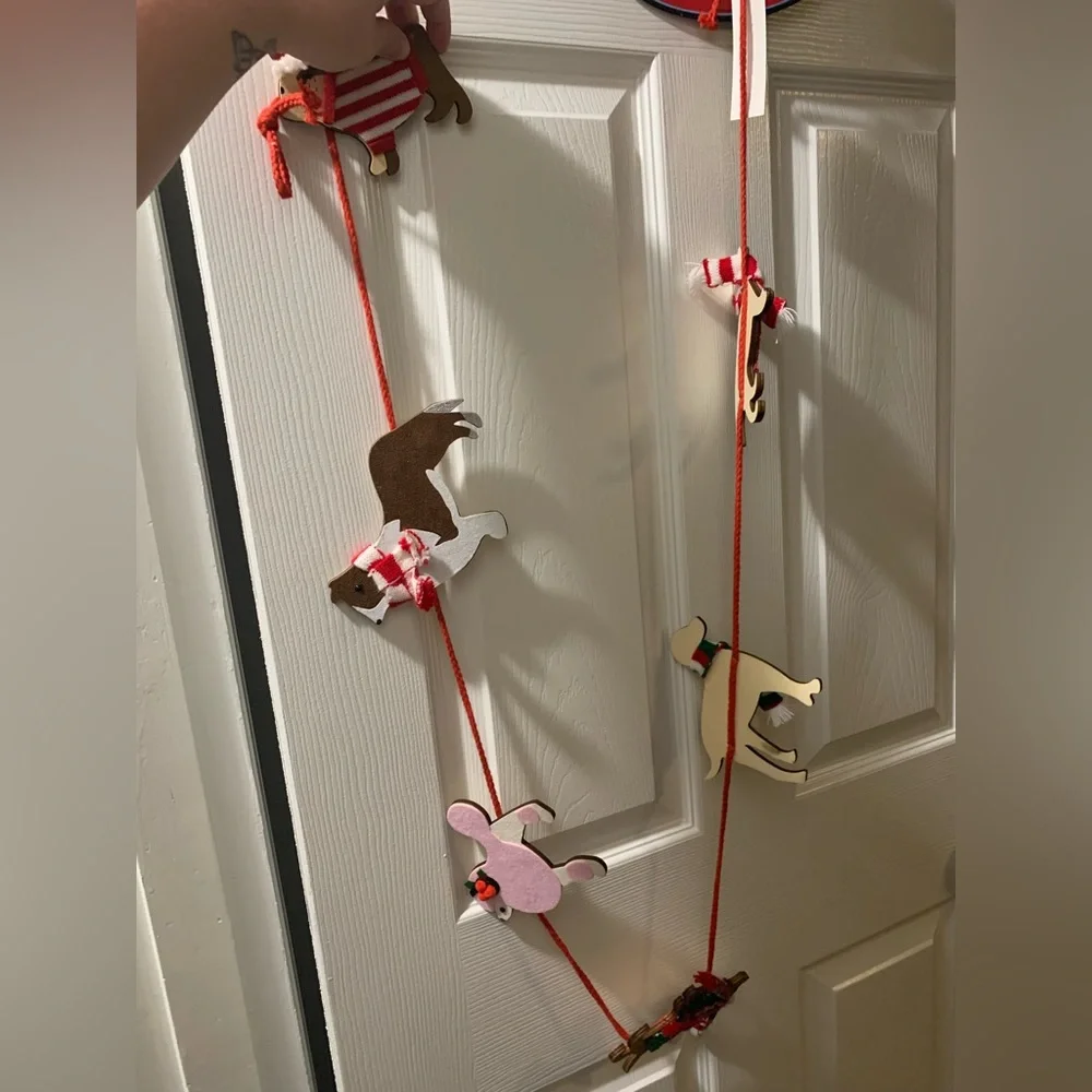 Brand new set of three dog garland